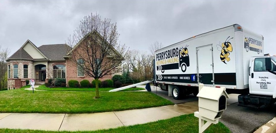 Perrysburg Moving truck in beautiful home driveway