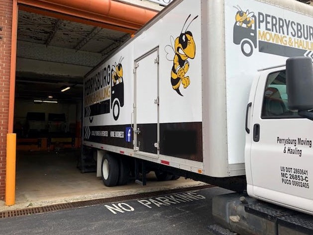 Perrysburg Moving truck in office parking garage